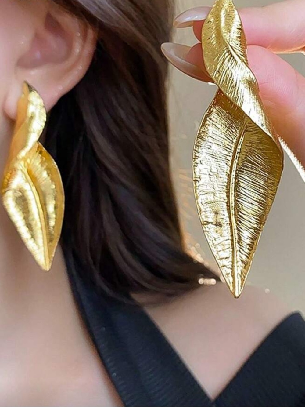 Elegant Gold Leaf Twist Drop Earrings